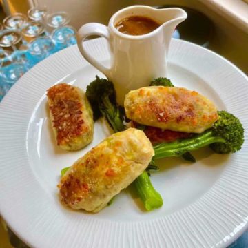 -Glamorgan sausages with potato fondant, caramelised onion gravy and roasted tenderstem broccoli