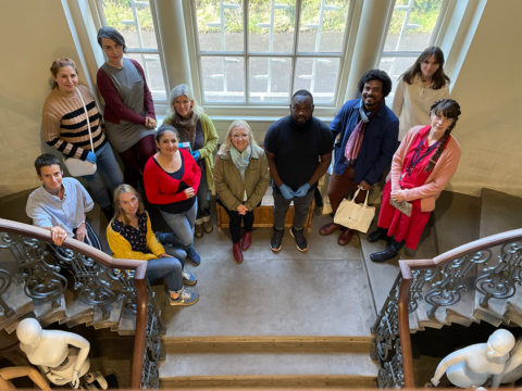Grand Tour group stood on the staircase at Platt Hall