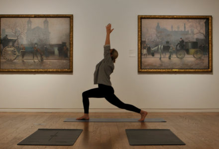 Yoga instructor stretching into a pose in Gallery 16