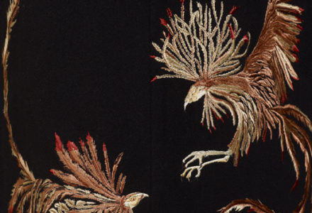 Alexander McQueen coat embroidered detail of two golden fighting cockerels